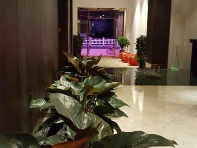 фотографии отеля Zhongzhou Jingxiu Holiday Hotel изображение №7