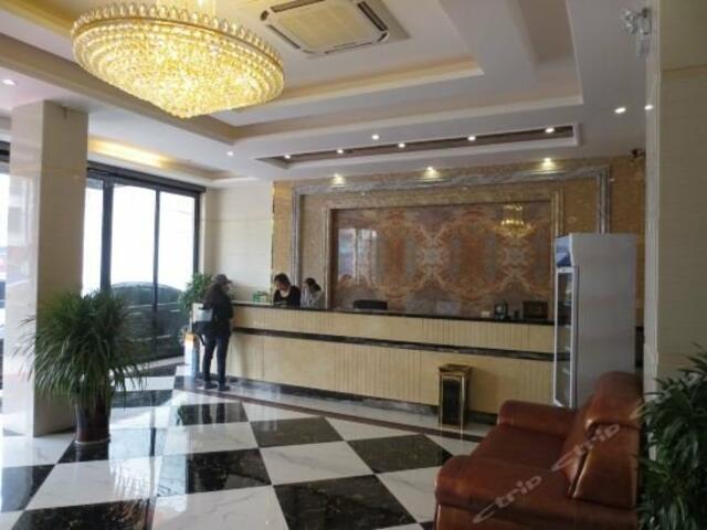 фото отеля Wanning Minghuang Business Hotel изображение №9