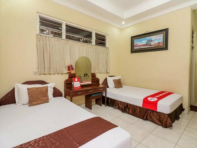 фото отеля Nida Rooms Yos Sudarso Badung At Hotel Ratu изображение №33
