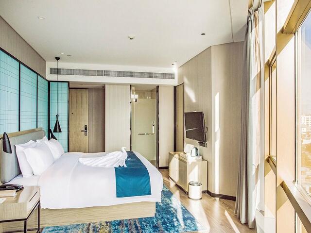 фото Echarm Hotel Qionghai Wanquanhe Branch изображение №18