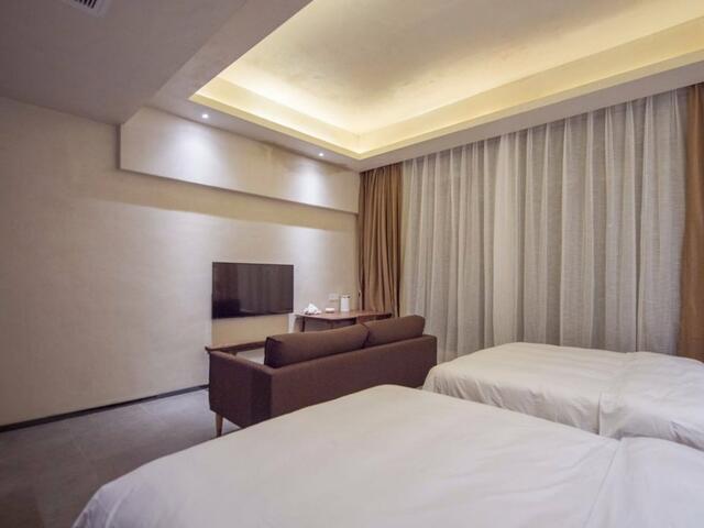 фото отеля Pu Shu Luxury Homestay Meilan Airport Free Transfer изображение №1
