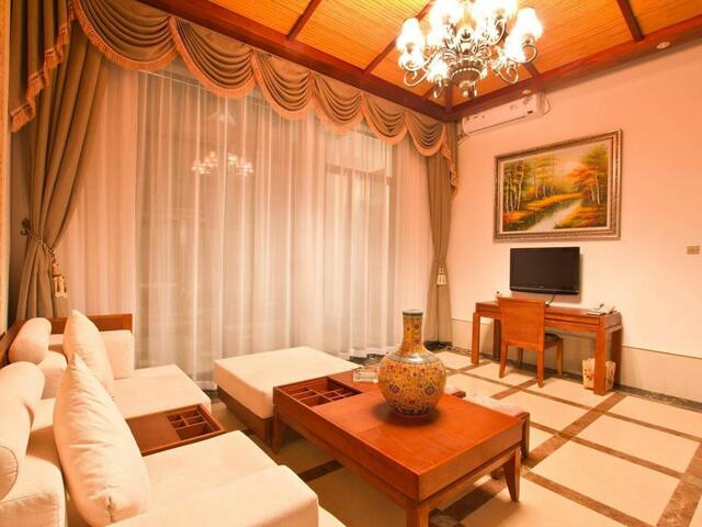 фото отеля Xinglong Old Banyan Hotel - Wanning изображение №25