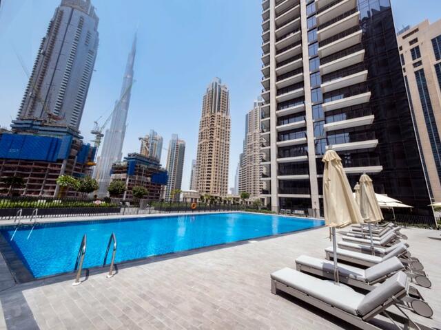 фото отеля Апартаменты Fantastay Towering Burj Khalifa views BLVD Crescent tower изображение №1