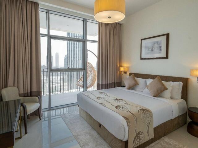 фото отеля Апартаменты Fantastay Towering Burj Khalifa views BLVD Crescent tower изображение №5
