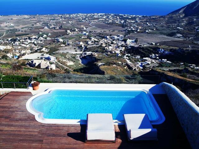 фотографии отеля Kamini Santorini Luxury Villas изображение №11