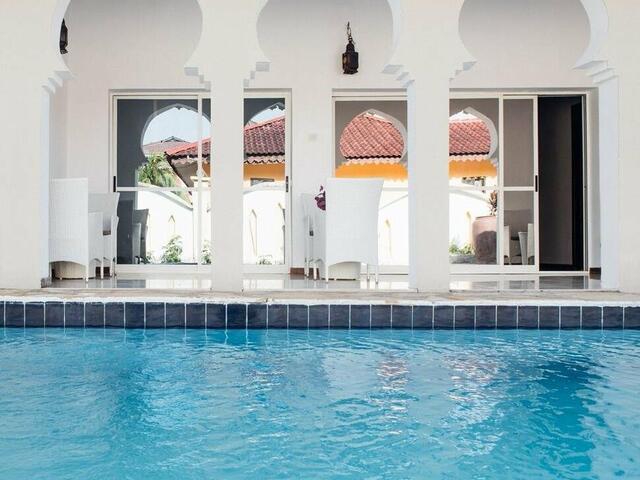 фотографии отеля Arabian Nights Villa изображение №7